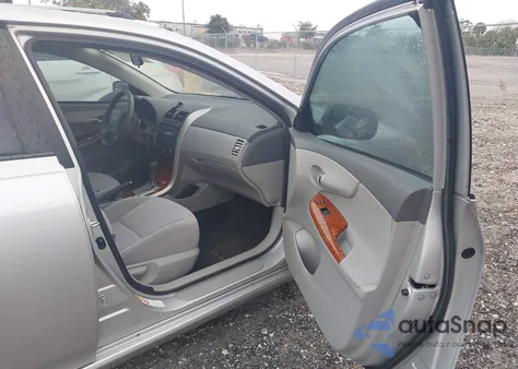 2009 Toyota Corolla Xle z USA, uszkodzony, nr VIN JTDBL40EX99060038